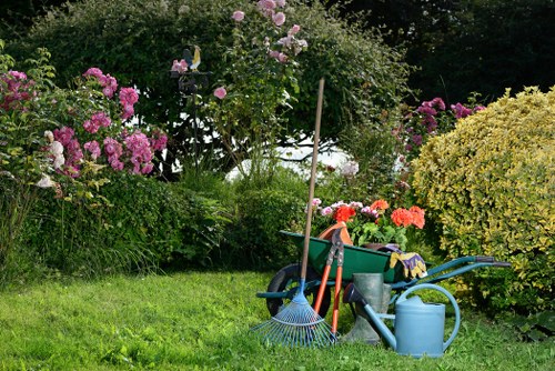 Stylish East Barnet landscape garden with layered planting and hard landscaping